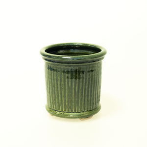 Tidlösa - bestickställ i keramik, grön glasyr.