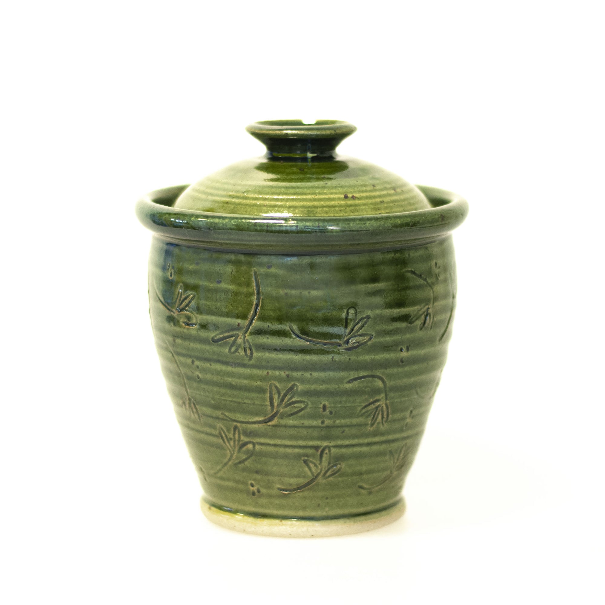 Liv - handdrejad burk med lock i keramik. Grön glasyr