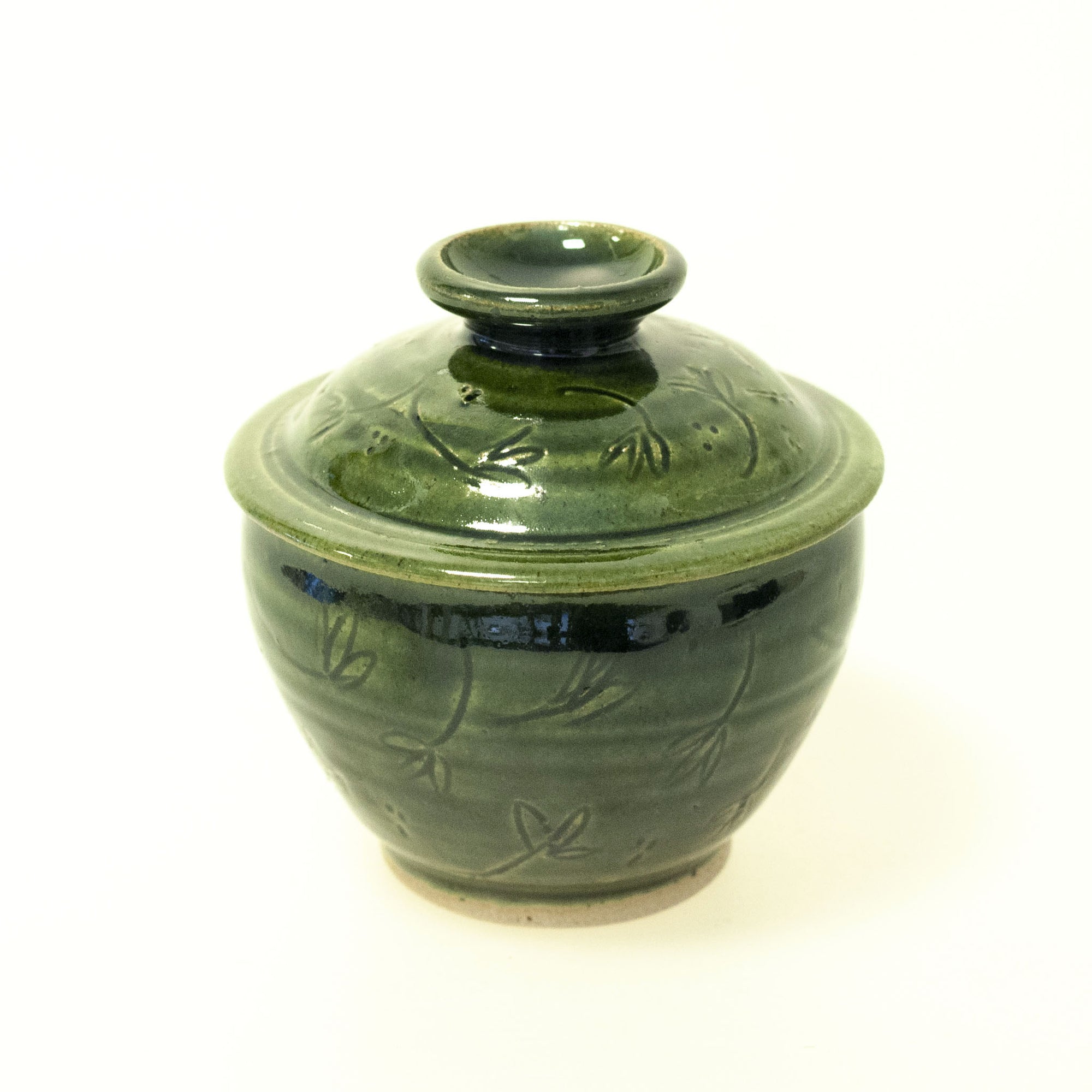 Liv - handdrejad burk med lock i keramik, liten. Grön glasyr